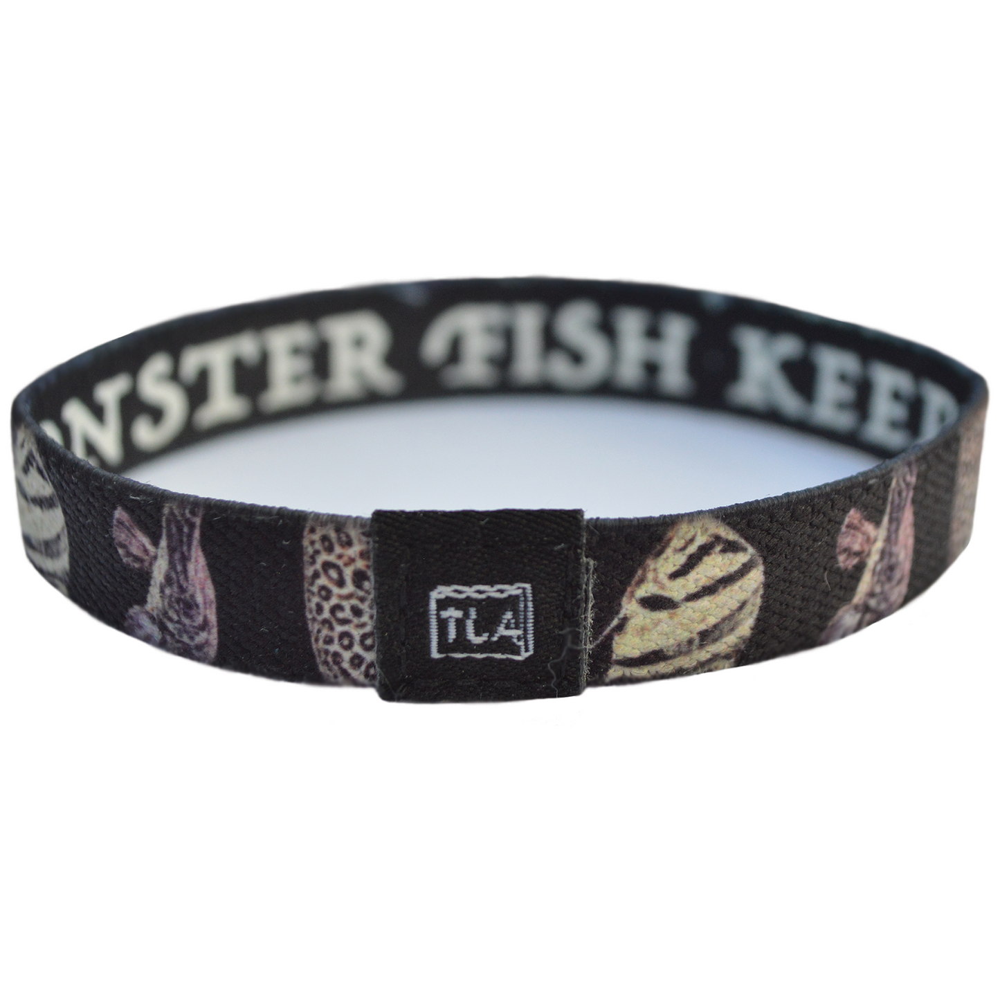 Monster Fish keeper reversible elastic bracelet from Tank Life Apparel. Great for tank keepers. Gift for pet fish and aquarium keepers and fresh water hobbyists. Gift for monster fish and rare exotic keepers. Predatory fish. Fishing bracelet. Datnoid, alligator gar, stingray, albino oscar, arapaima, Frontosa, arowana.