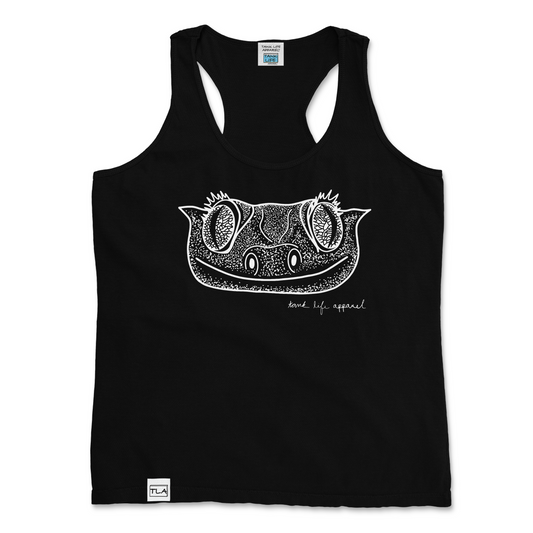 The Tank Life Apparel crested gecko face design on a stylish women's tank top with our custom TLA hem label. Smiling crestie lizard with big eyes design in white.