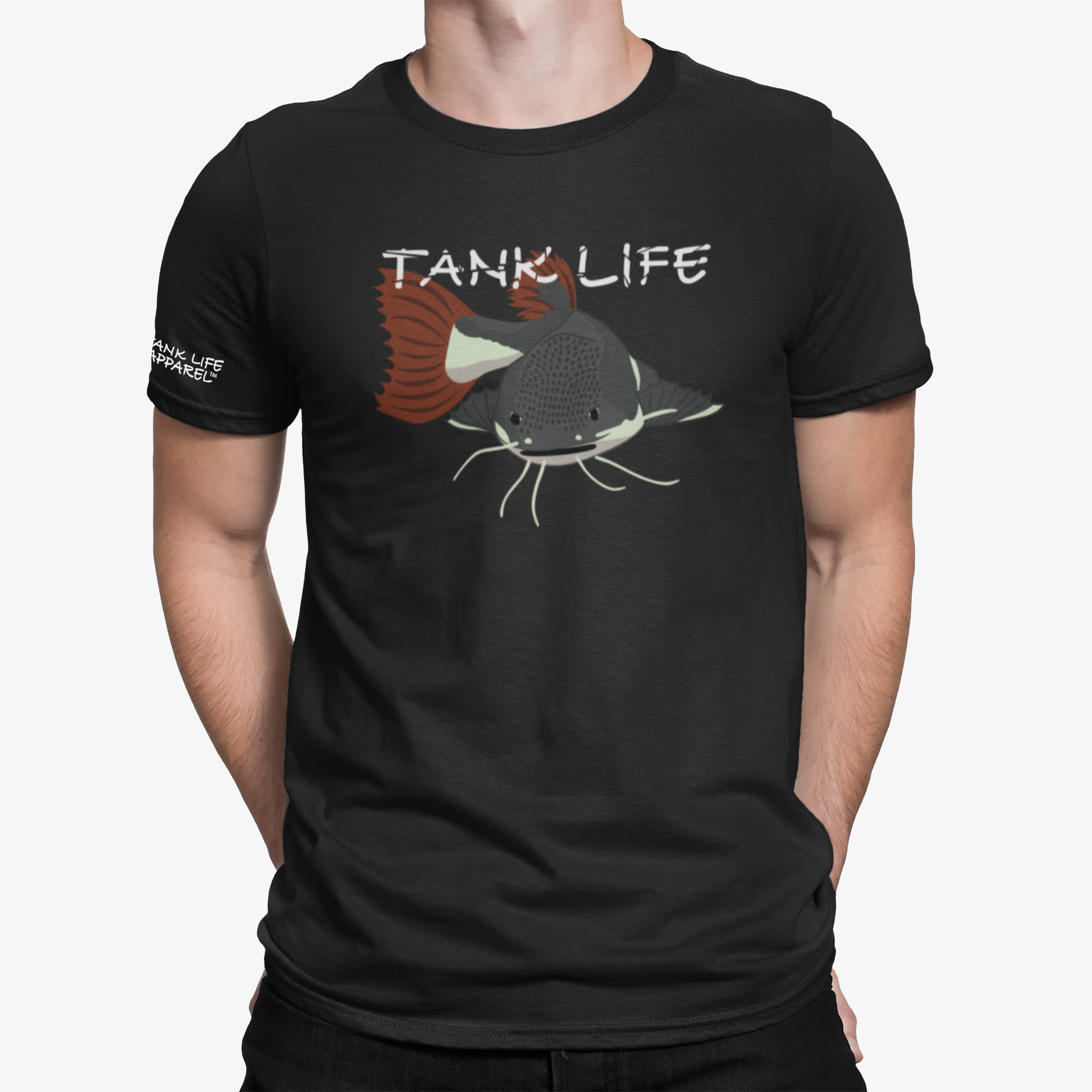 The Tank Life Apparel red tail catfish design on an athletic dri fit performance shirt. Gray catfish with white belly and whiskers and red tail.